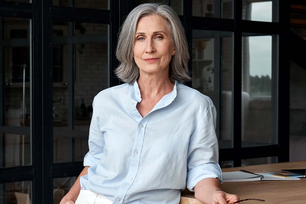 woman happy, with healthy looking breasts after breast reconstruction in Connecticut